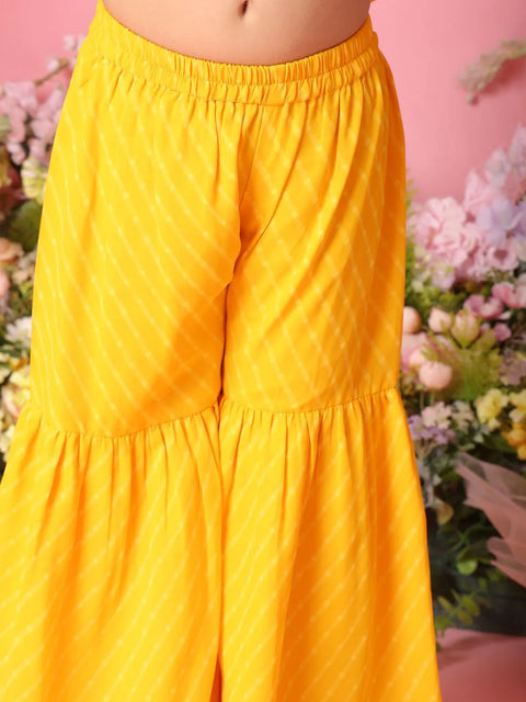 Yellow pants with a floral background