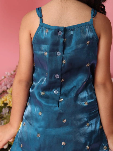Blue dress with floral patterns on a pink background