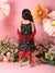 Child in traditional outfit with floral decorations and flowers in the background