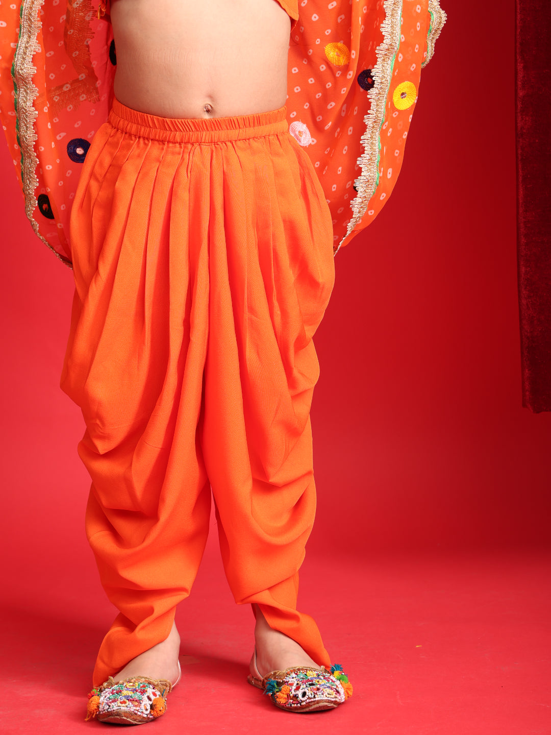 Girls Orange Patiala Suit with Mirror Work