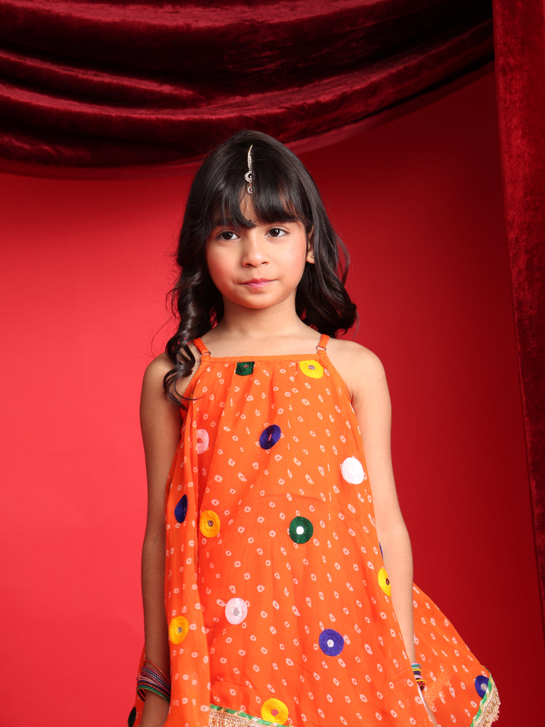 Girls Orange Patiala Suit with Mirror Work
