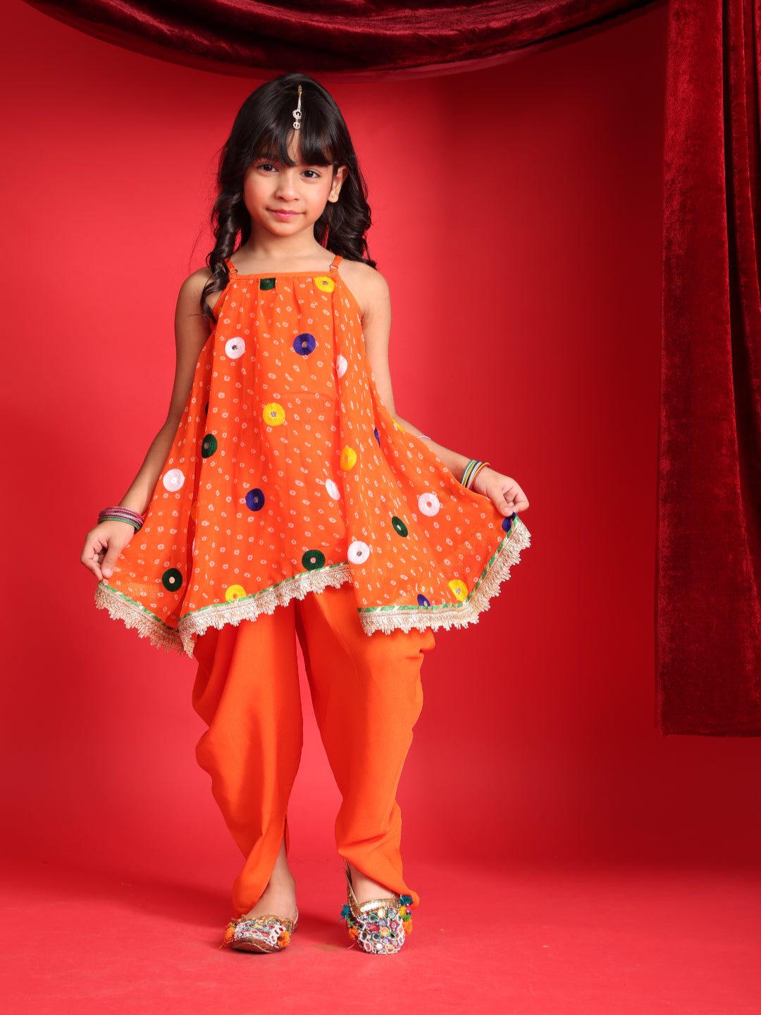 Girls Orange Patiala Suit with Mirror Work