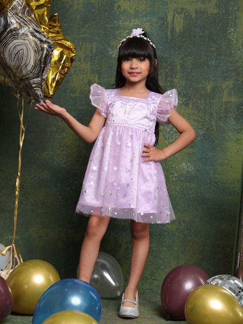 Young girl in a purple dress with balloons on a green textured background