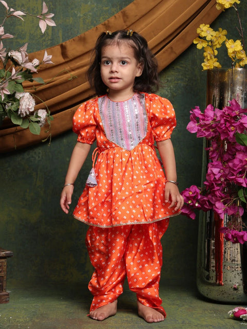 girls-orange-angrakha-kurta-with-dhoti-pants-festive-ethnic-set-by-saka-designs