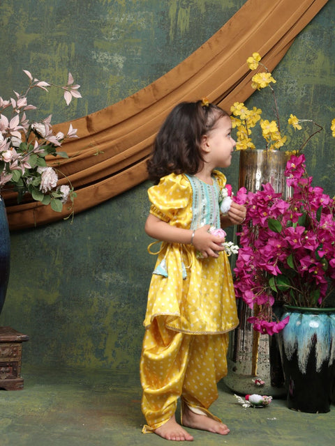 girls-yellow-printed-angrakha-kurta-with-dhoti-pants-ethnic-festive-set-by-saka-designs