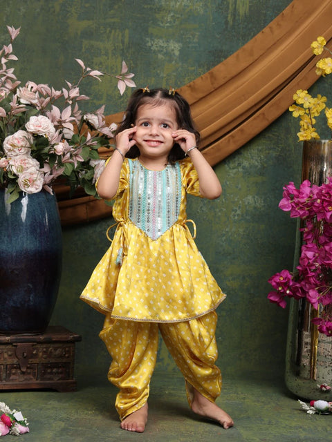 girls-yellow-printed-angrakha-kurta-with-dhoti-pants-ethnic-festive-set-by-saka-designs