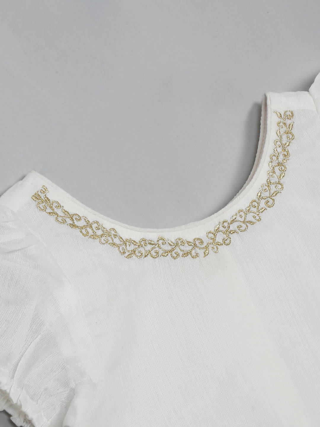 saka-designs-white-lehenga-choli-with-dupatta-adorned-with-golden-border-for-girls