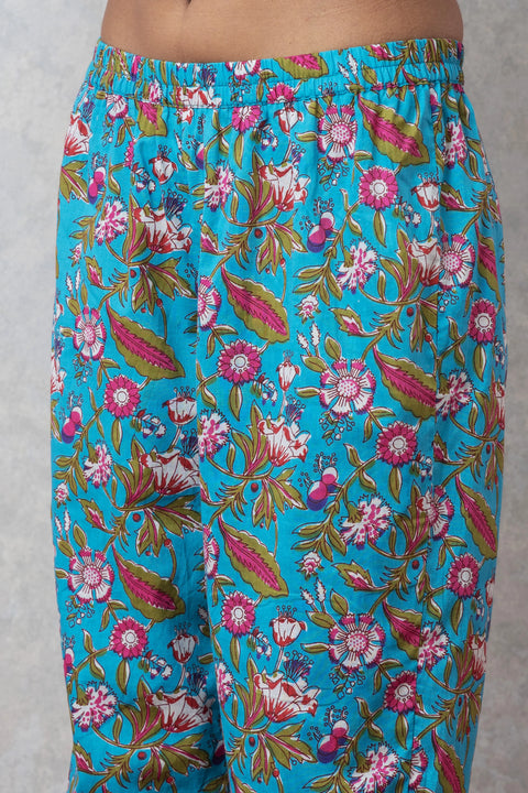 Floral-patterned pants on a plain background