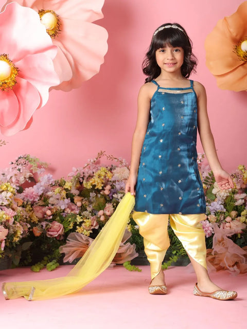 Young girl in a blue and yellow traditional outfit with flowers in the background