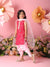 Young girl in a pink traditional outfit with flowers and decorative elements on a pink background