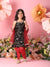 Young girl in traditional outfit with floral and pink background