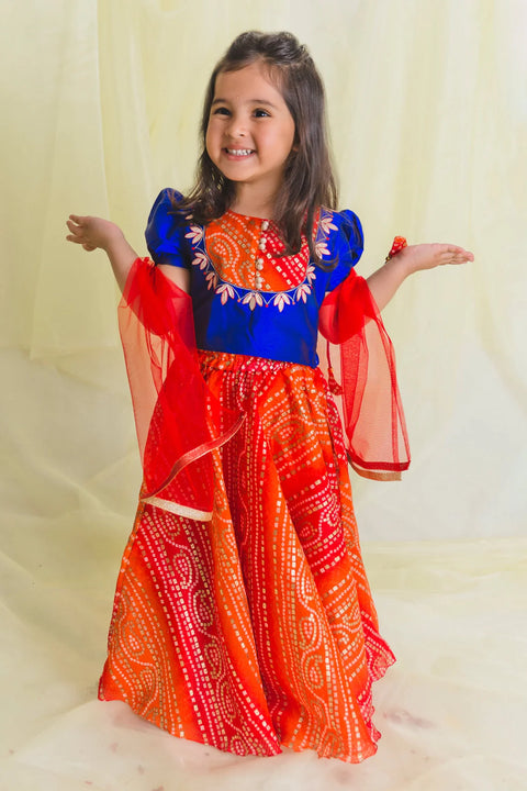 Saka Designs Girl Orange And Blue Bandhani Lehenga With Embroidered Choli & Dupatta