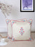 Square ivory cushion cover featuring intricate Mughal embroidery, perfect for elegant home décor.
